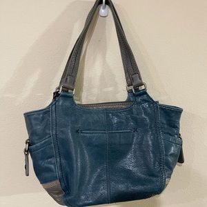 The SAK warm navy in color purse NWT